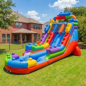 Block Party Blitz 20ft Dual Lane Lego Water Slide rental from InflatableTX in North DFW