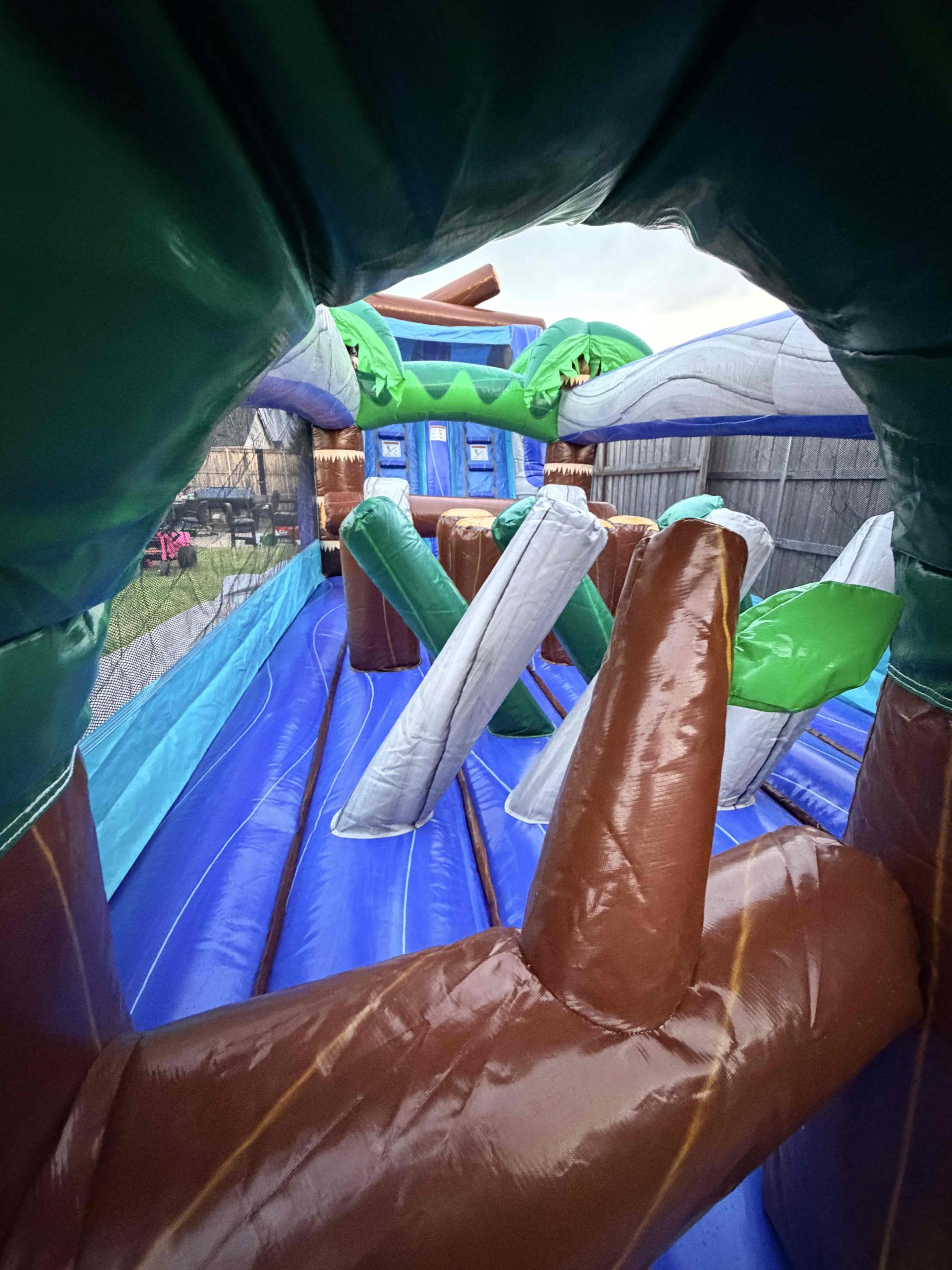 Another view of the Tropical Surge 45ft Duel Lane Obstacle Run party rental